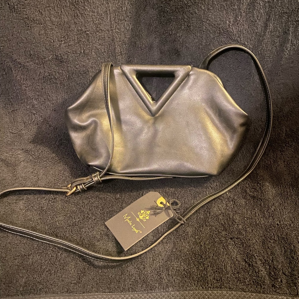 Cute black faux leather purse, never used, brand new